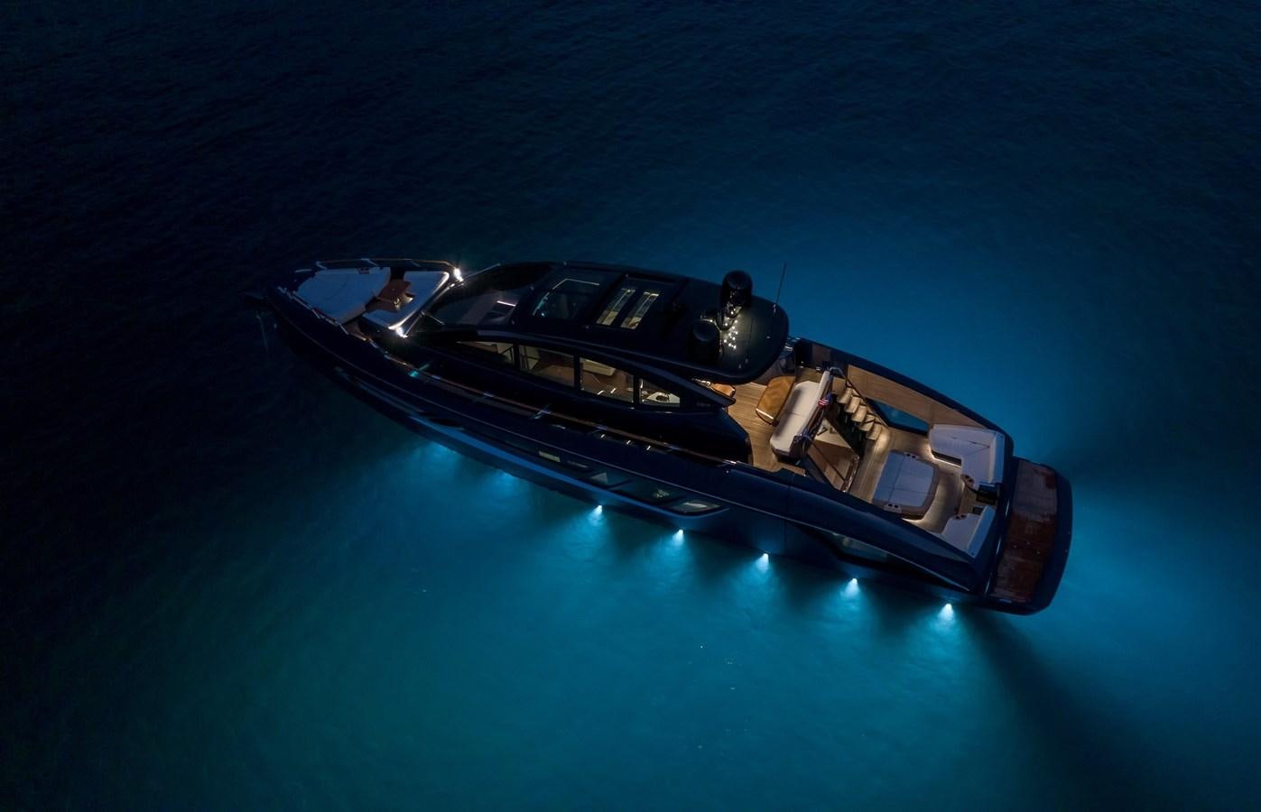 a car on a blue surface aboard 2024 LAZZARA LSX 67 Yacht for Sale
