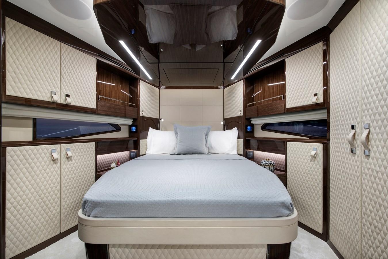 a bed in a room aboard LSX 67 SPORT EXPRESS Yacht for Sale