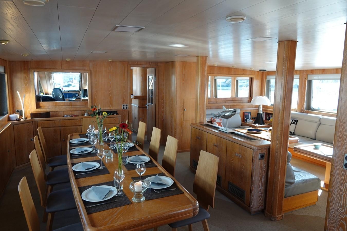 a kitchen with a dining table aboard ONYX 2 Yacht for Sale