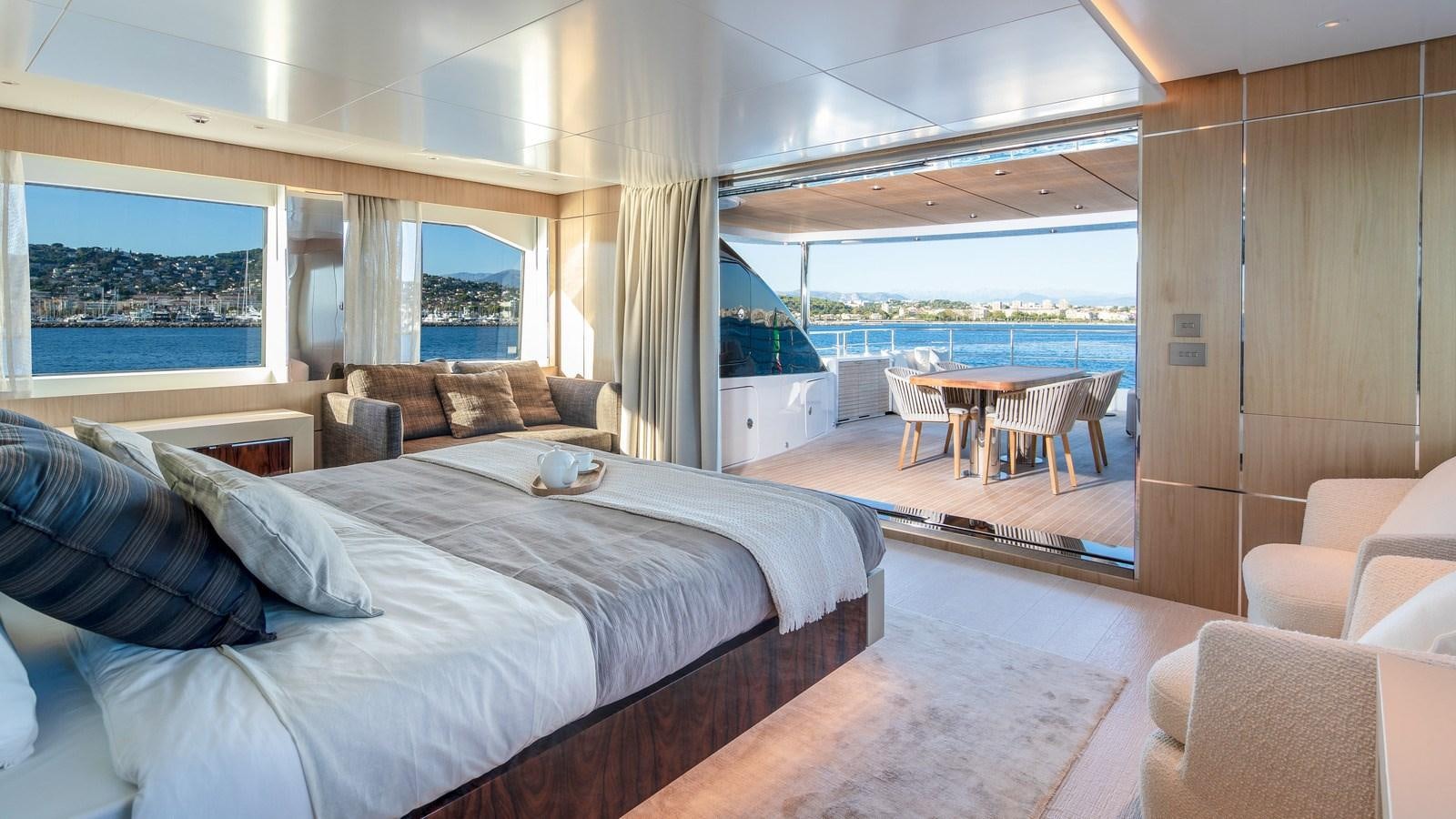 a large bed in a room aboard OCEANIC GRAND Yacht for Sale
