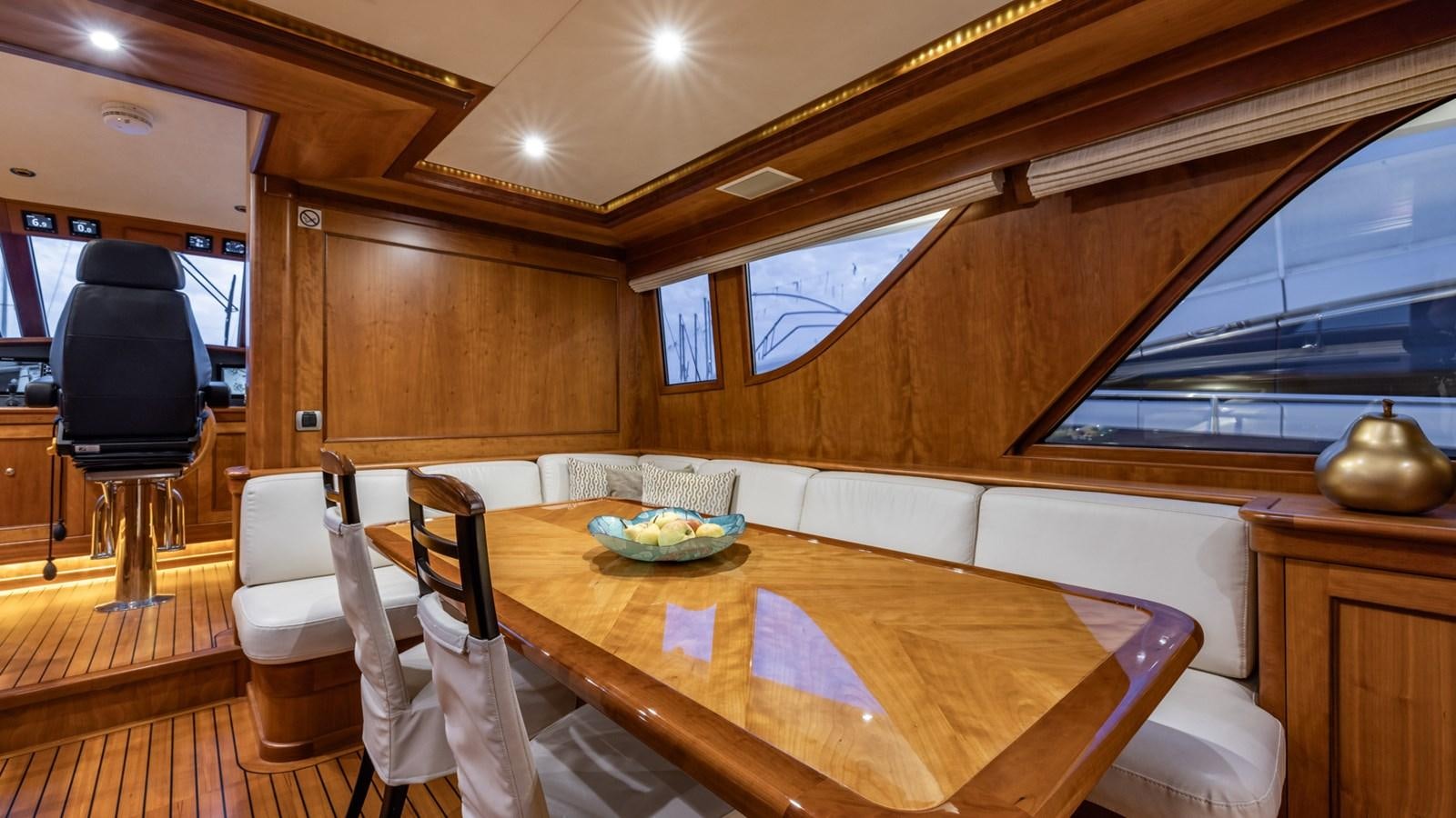 a dining table in a cabin aboard SEA BREEZE II Yacht for Sale