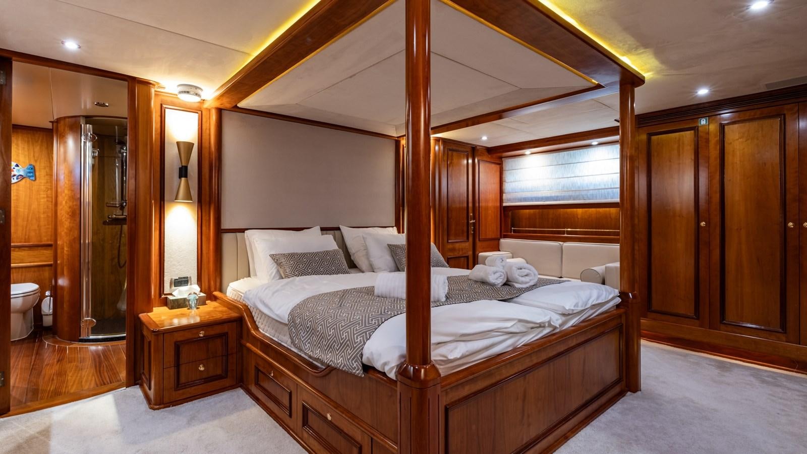 a large bed in a hotel room aboard SEA BREEZE II Yacht for Sale