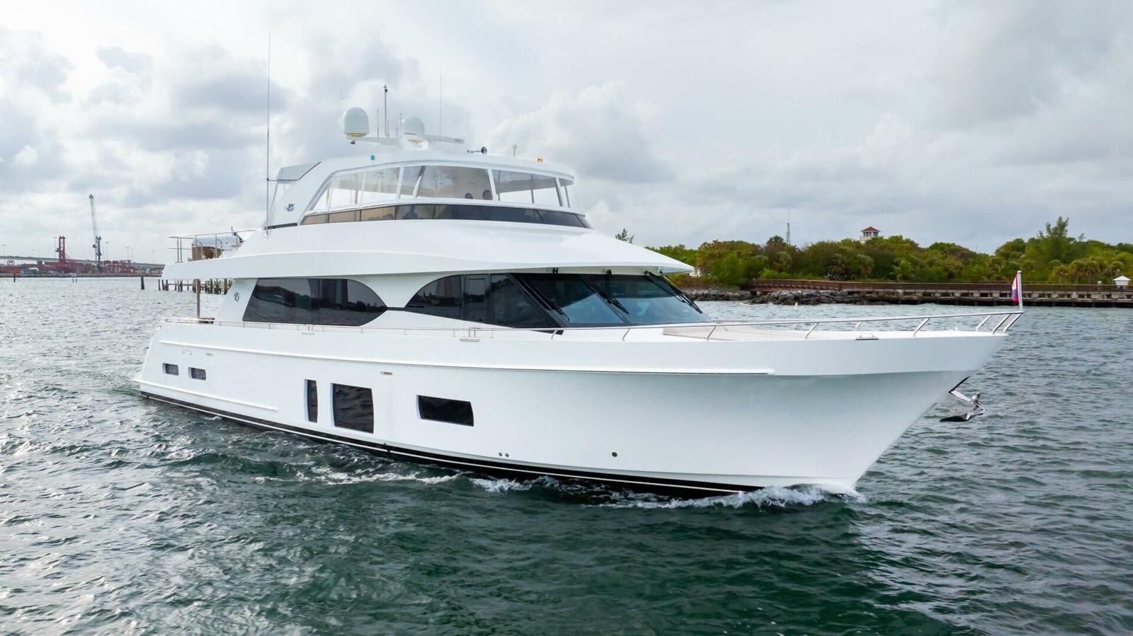 a white yacht in the water aboard CRUMDALE Yacht for Sale
