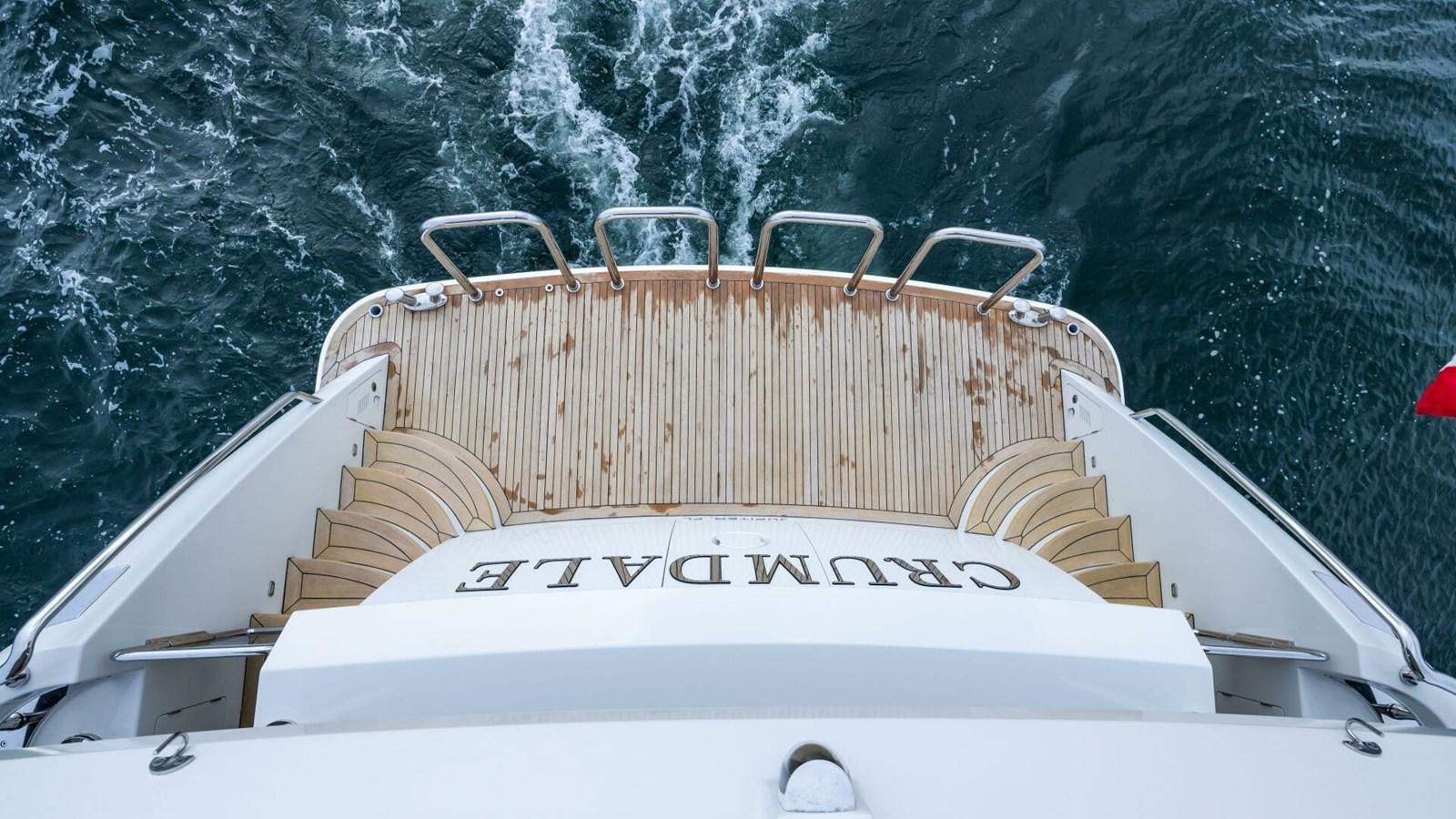 a white boat with a metal railing aboard CRUMDALE Yacht for Sale