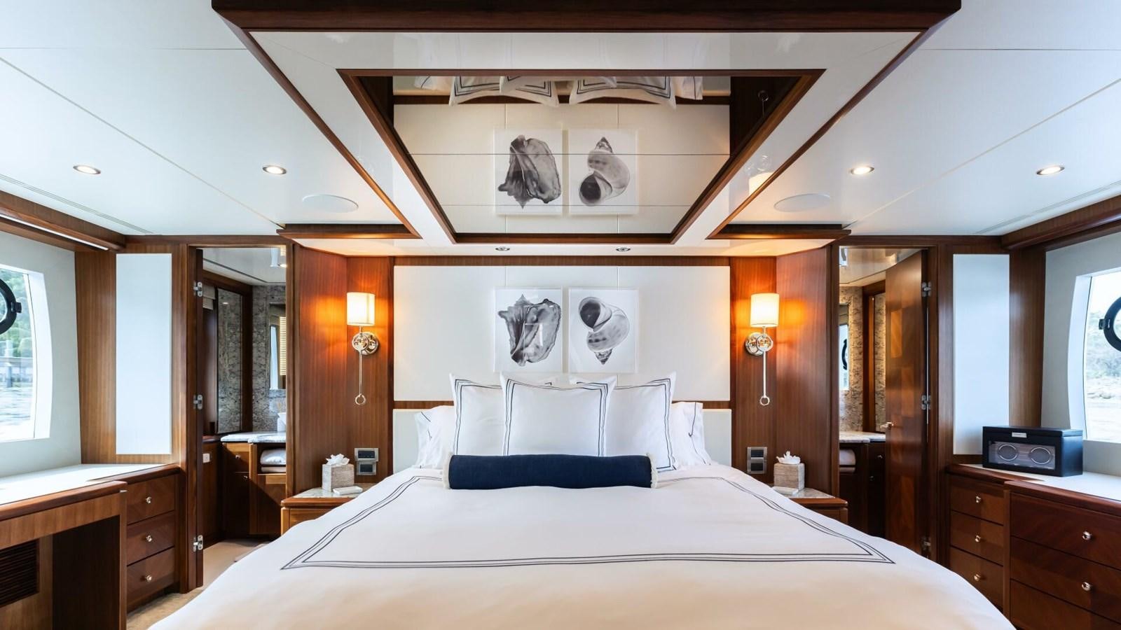 a large bed in a room aboard CRUMDALE Yacht for Sale