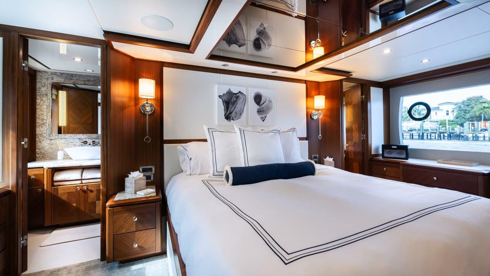 a bed in a room aboard CRUMDALE Yacht for Sale