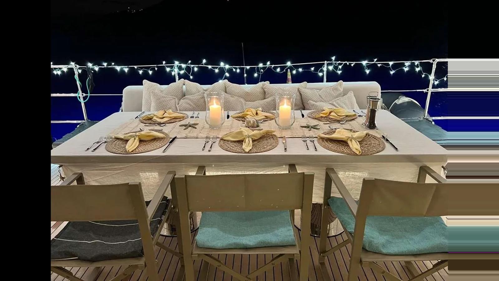 a table with food on it aboard SEACLUSION Yacht for Sale