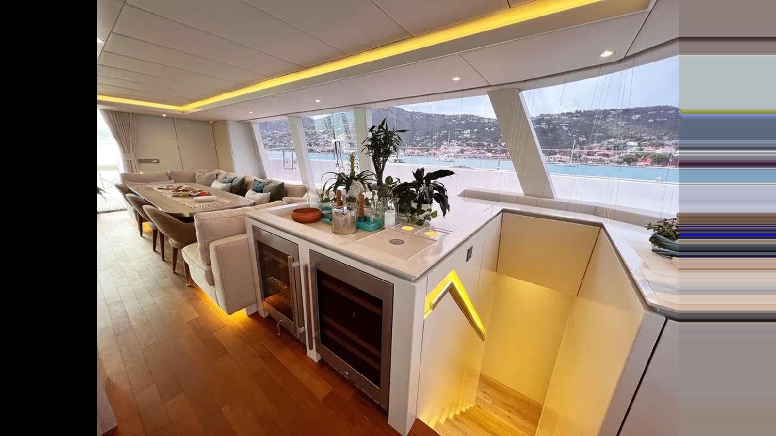 a kitchen with a large window aboard SEACLUSION Yacht for Sale