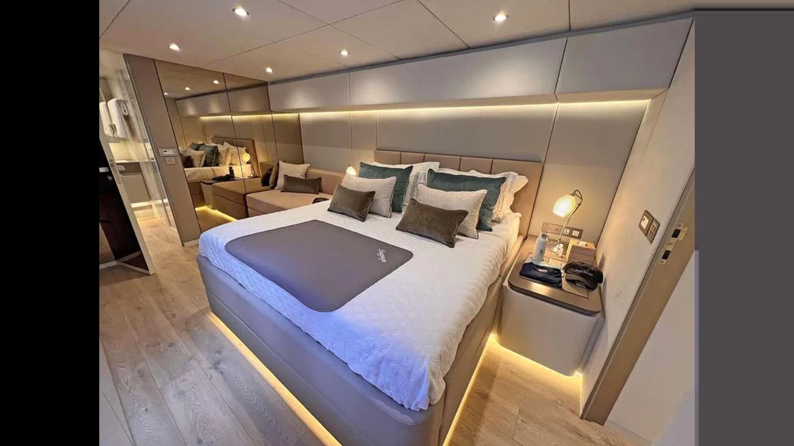 a bed in a room aboard SEACLUSION Yacht for Sale
