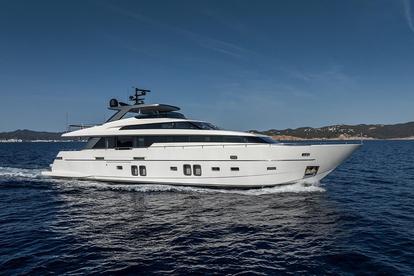 a white yacht on the water aboard COBANA Yacht for Sale