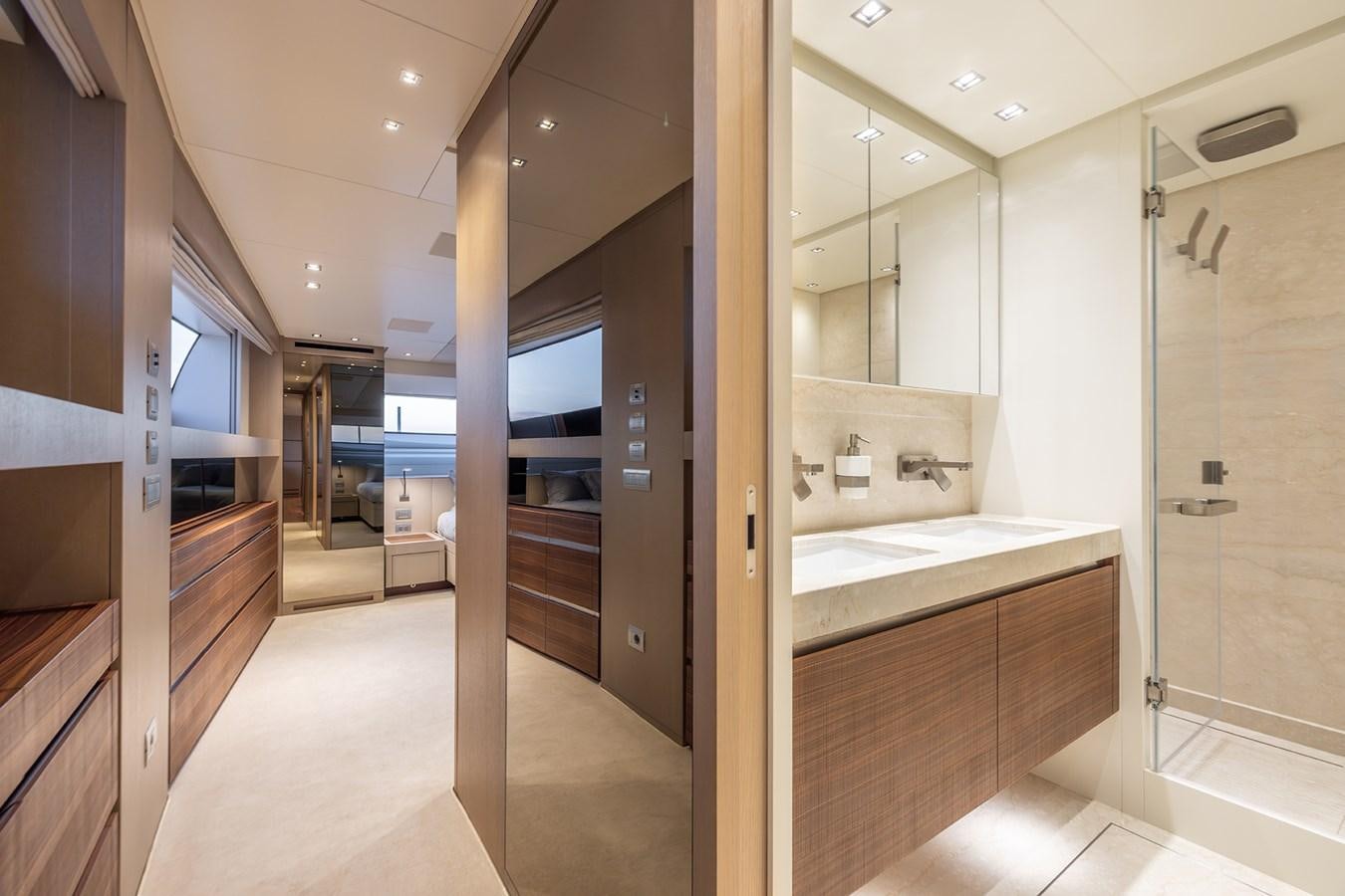 a bathroom with a large mirror aboard COBANA Yacht for Sale