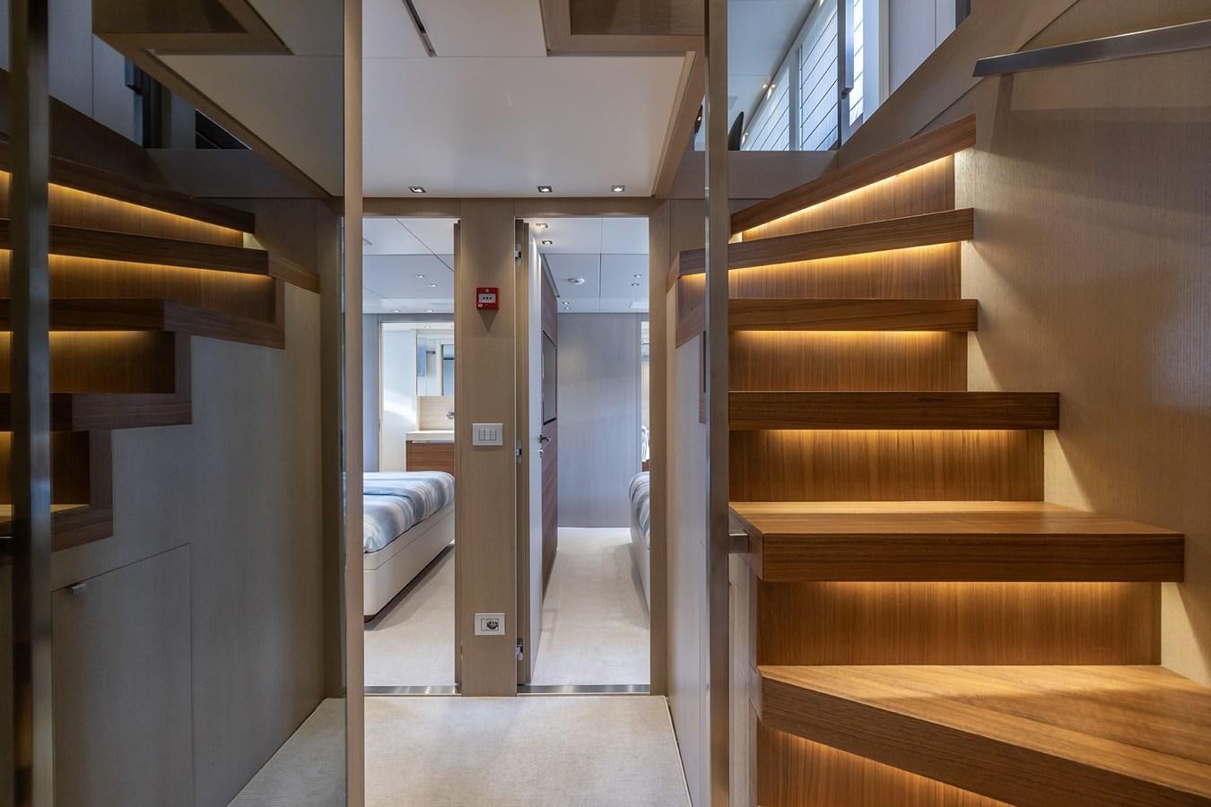a staircase in a building aboard COBANA Yacht for Sale