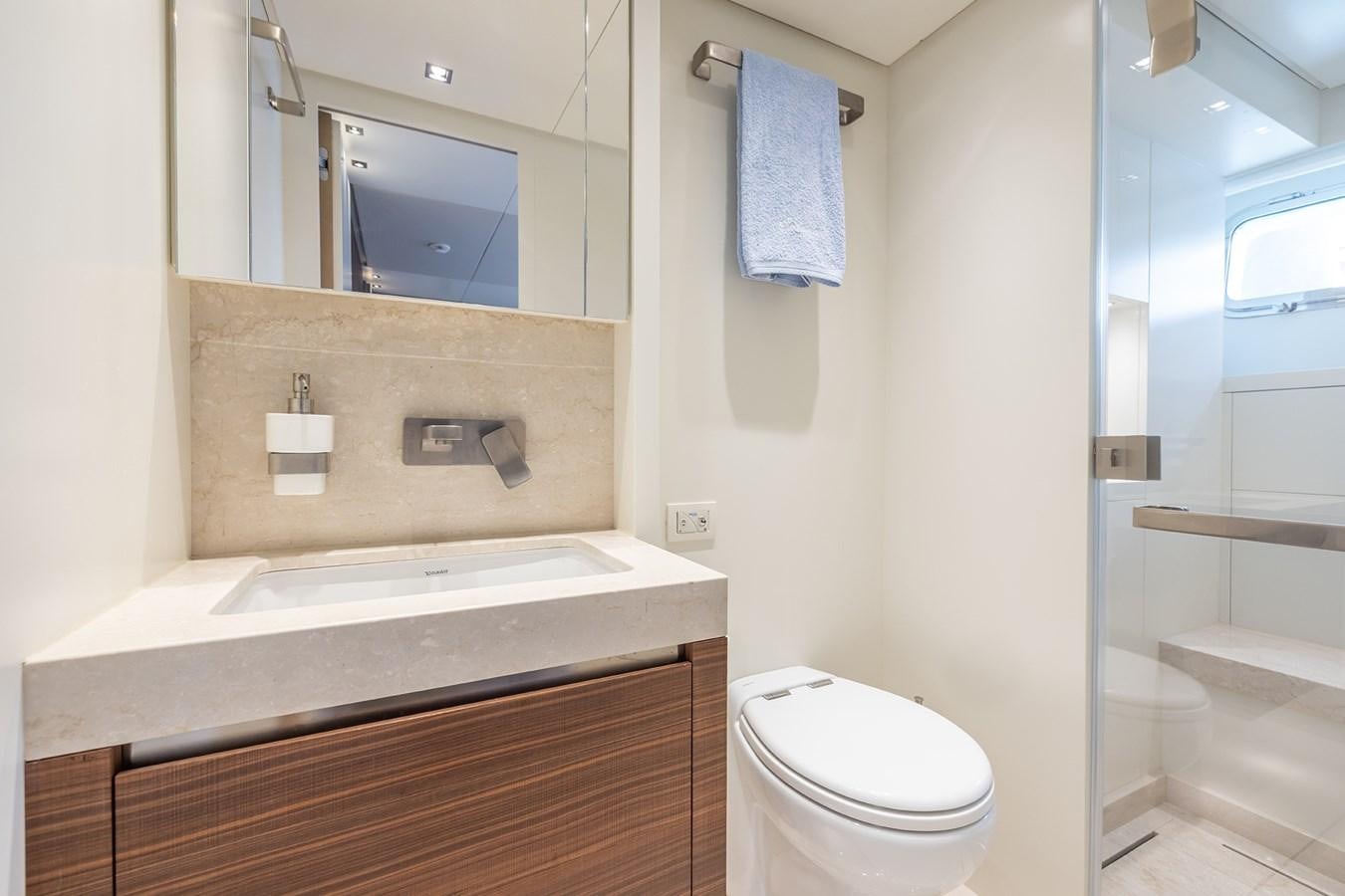 a bathroom with a sink and a toilet aboard COBANA Yacht for Sale