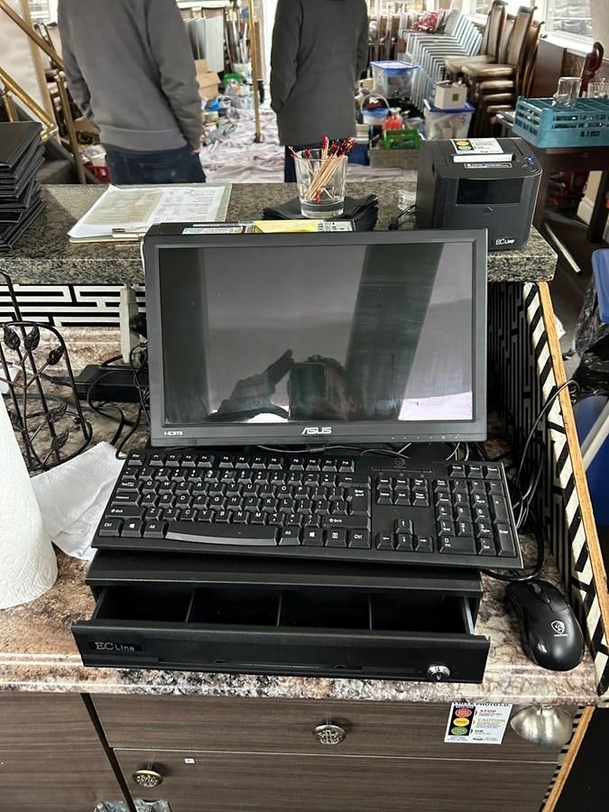 a laptop on a table aboard 1990 PALMER MARINE 68 Yacht for Sale