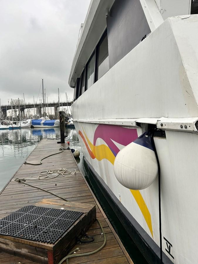 a boat on the water aboard 1990 PALMER MARINE 68 Yacht for Sale