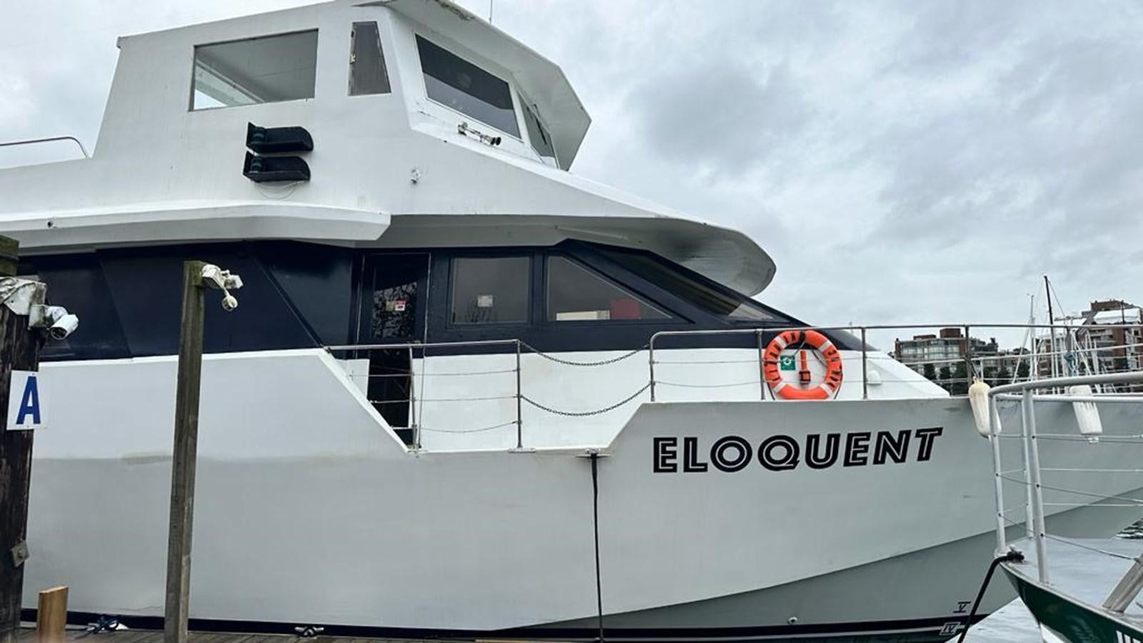 a white boat with a red logo aboard 1990 PALMER MARINE 68 Yacht for Sale