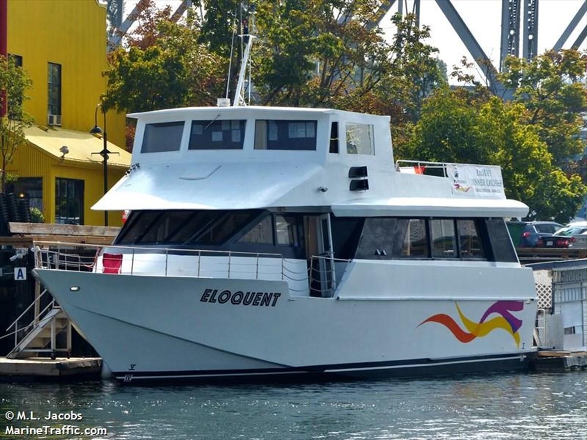 a boat docked in a harbor aboard 1990 PALMER MARINE 68 Yacht for Sale