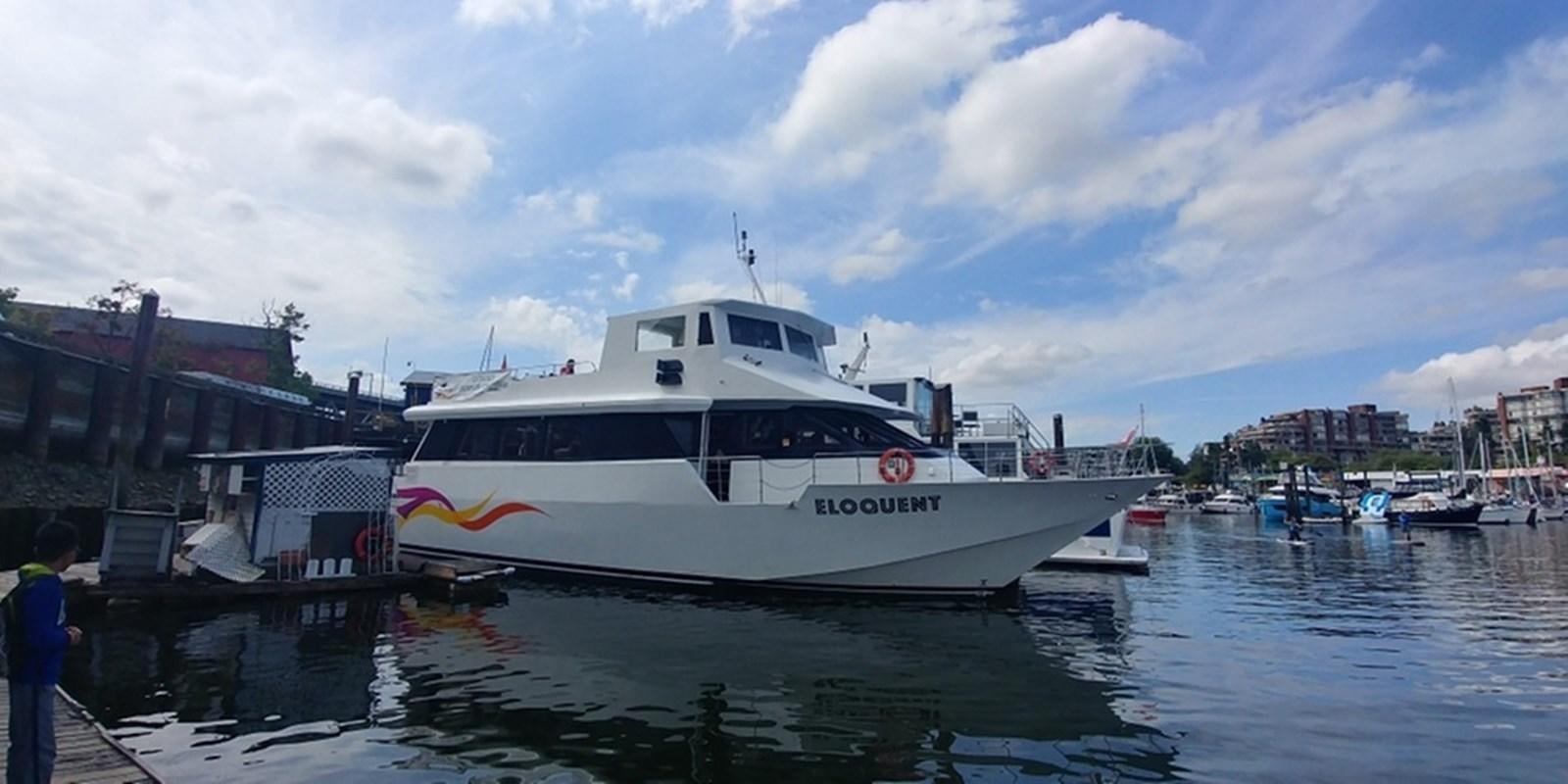 a boat docked at a pier aboard 1990 PALMER MARINE 68 Yacht for Sale