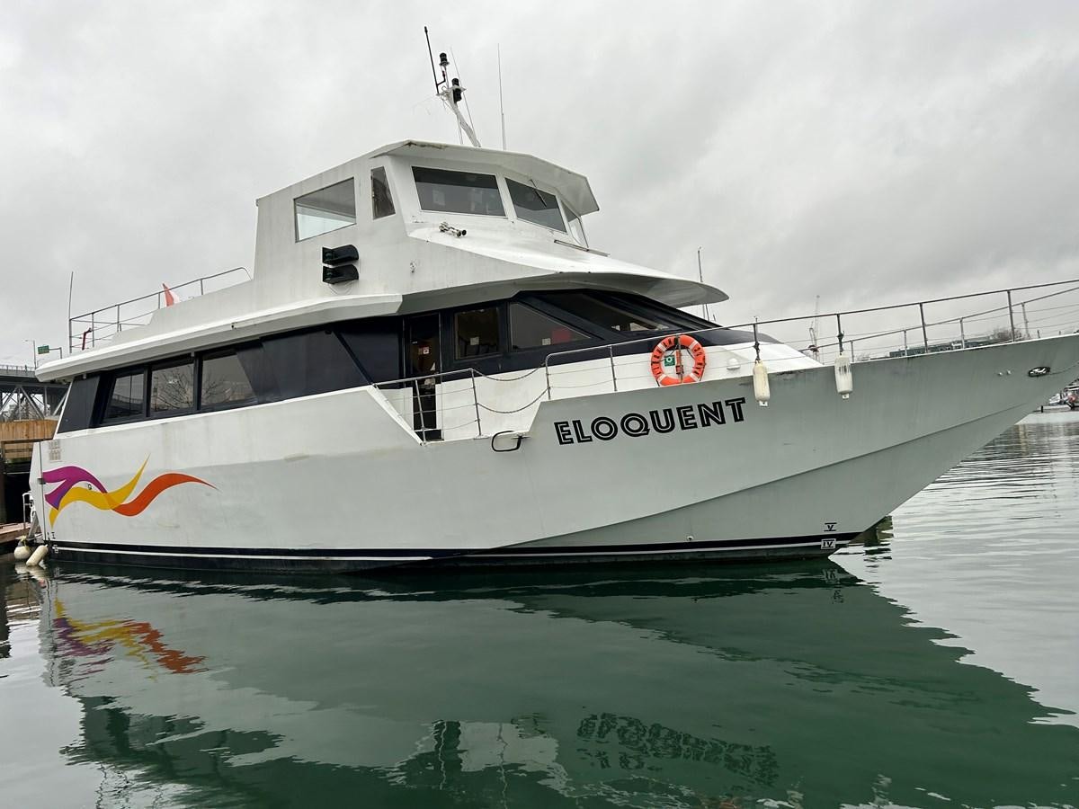 a white boat on water aboard 1990 PALMER MARINE 68 Yacht for Sale