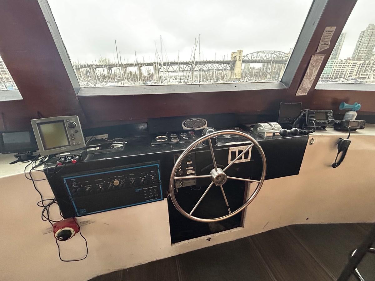 a large speaker system on a table aboard 1990 PALMER MARINE 68 Yacht for Sale