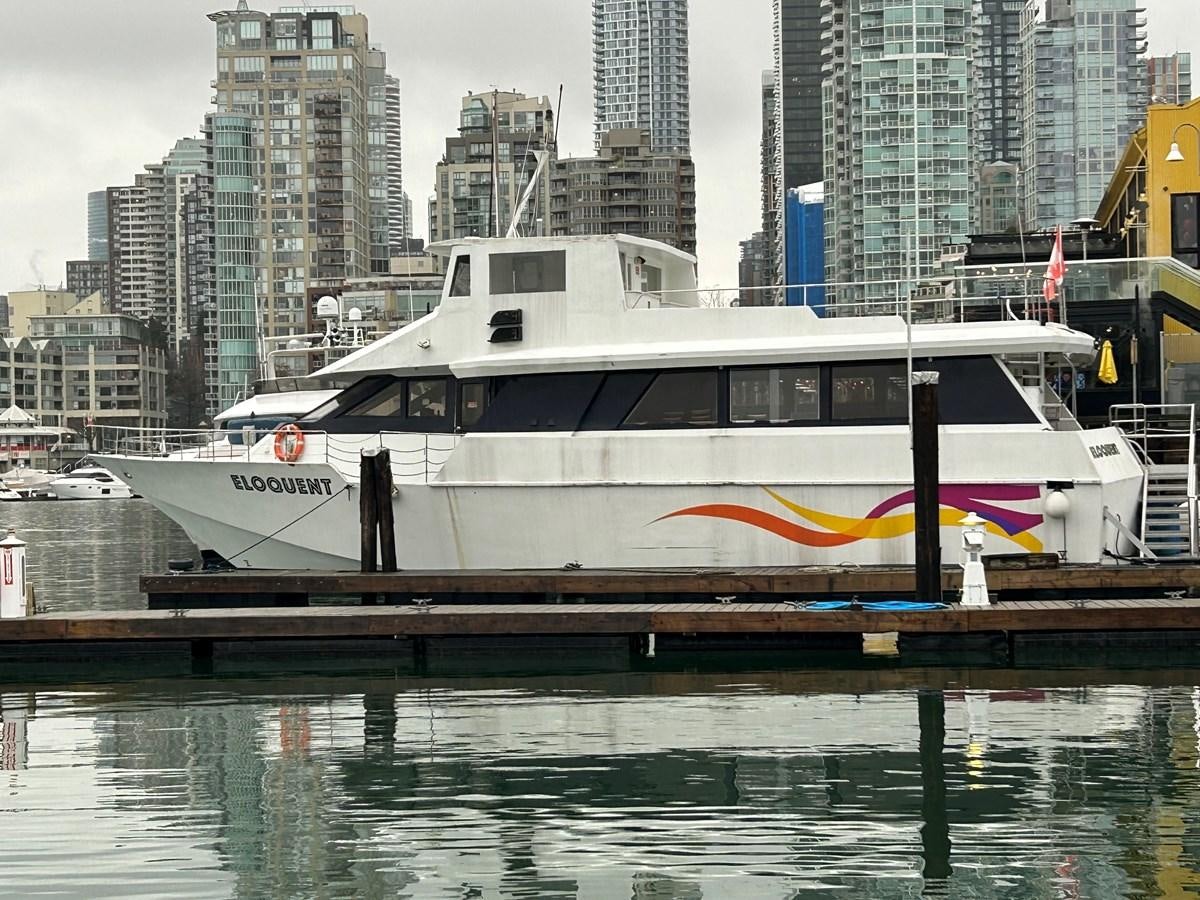 a boat on a dock aboard 1990 PALMER MARINE 68 Yacht for Sale