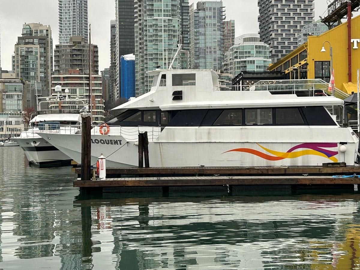 a boat on a body of water aboard 1990 PALMER MARINE 68 Yacht for Sale