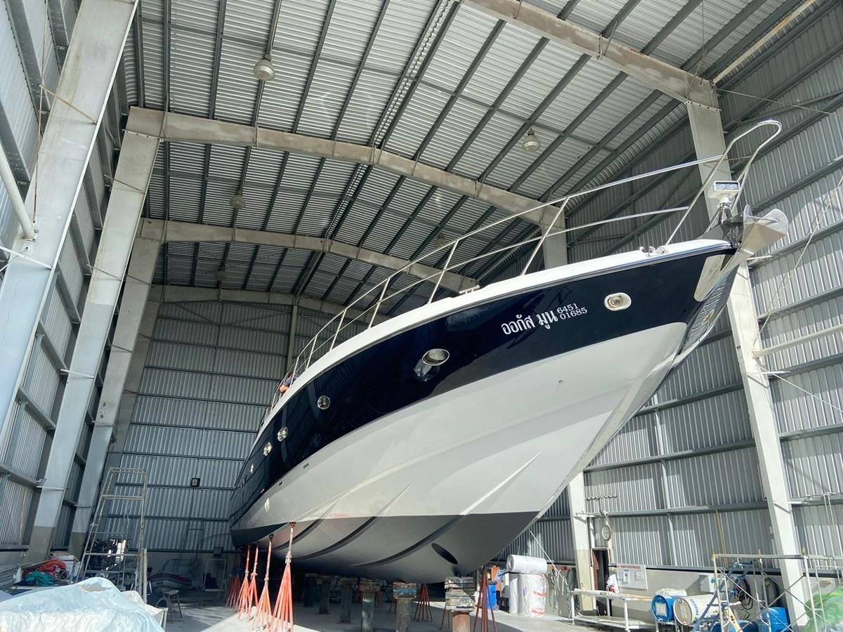 a large metal structure with a blue and white sign on it aboard AUGUST MOON Yacht for Sale