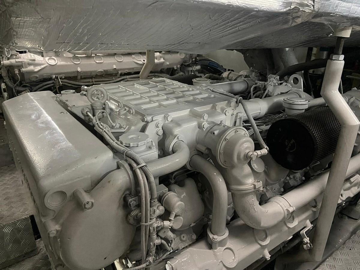 a close-up of a car engine aboard AUGUST MOON Yacht for Sale