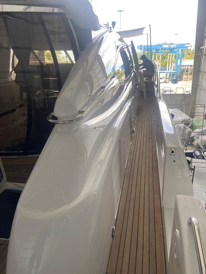 a white car with a large windshield aboard AUGUST MOON Yacht for Sale