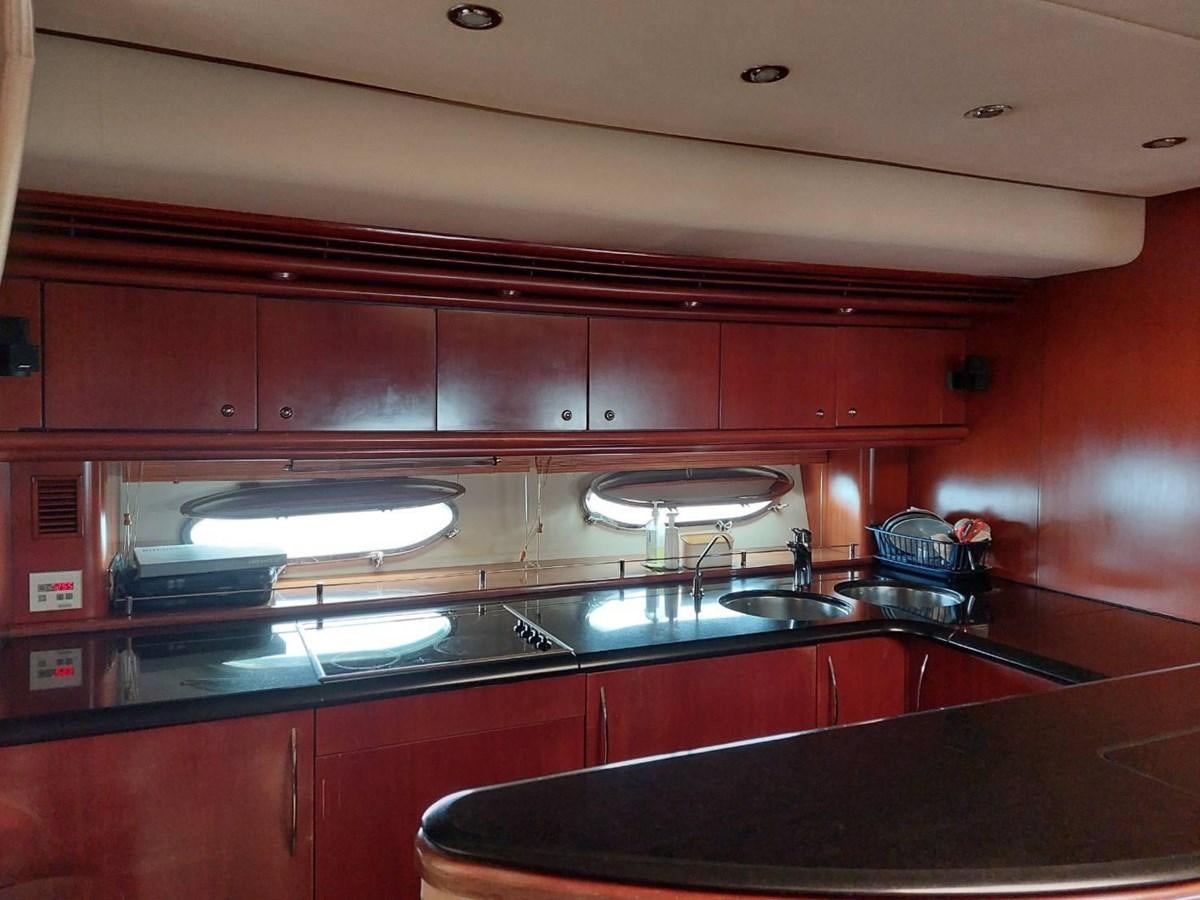 a kitchen with a stove and a sink aboard AUGUST MOON Yacht for Sale