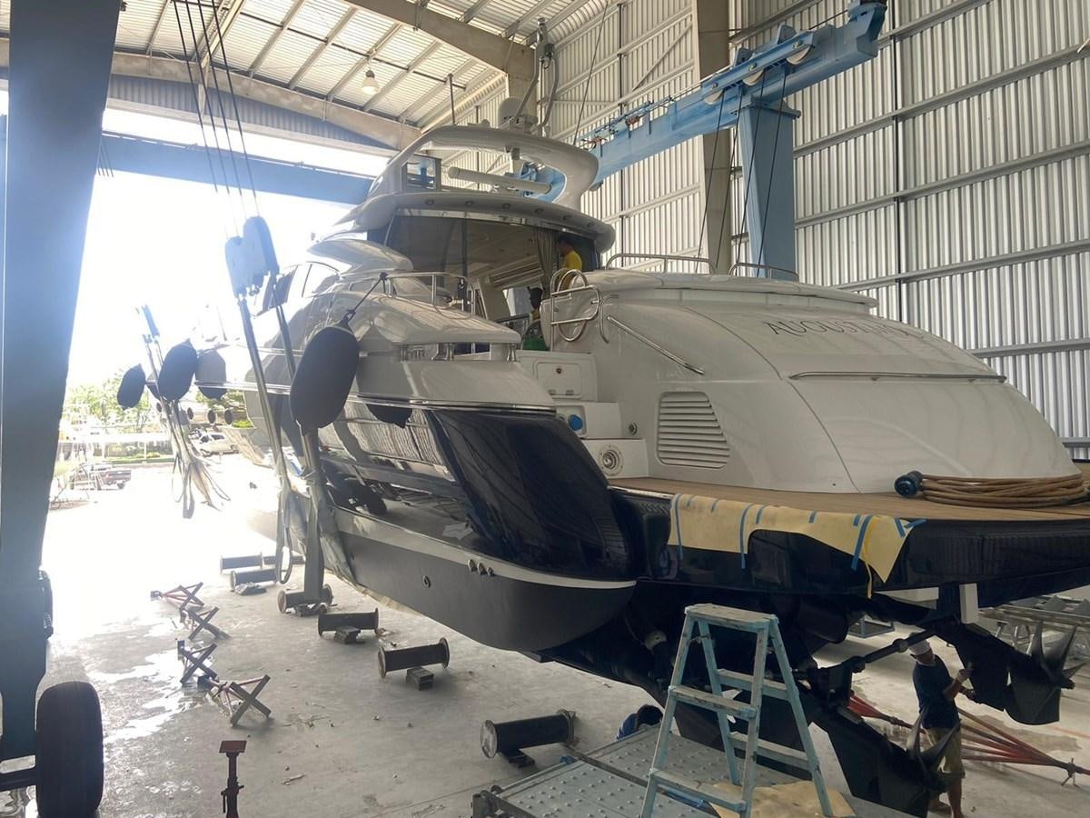 a military plane in a hangar aboard AUGUST MOON Yacht for Sale