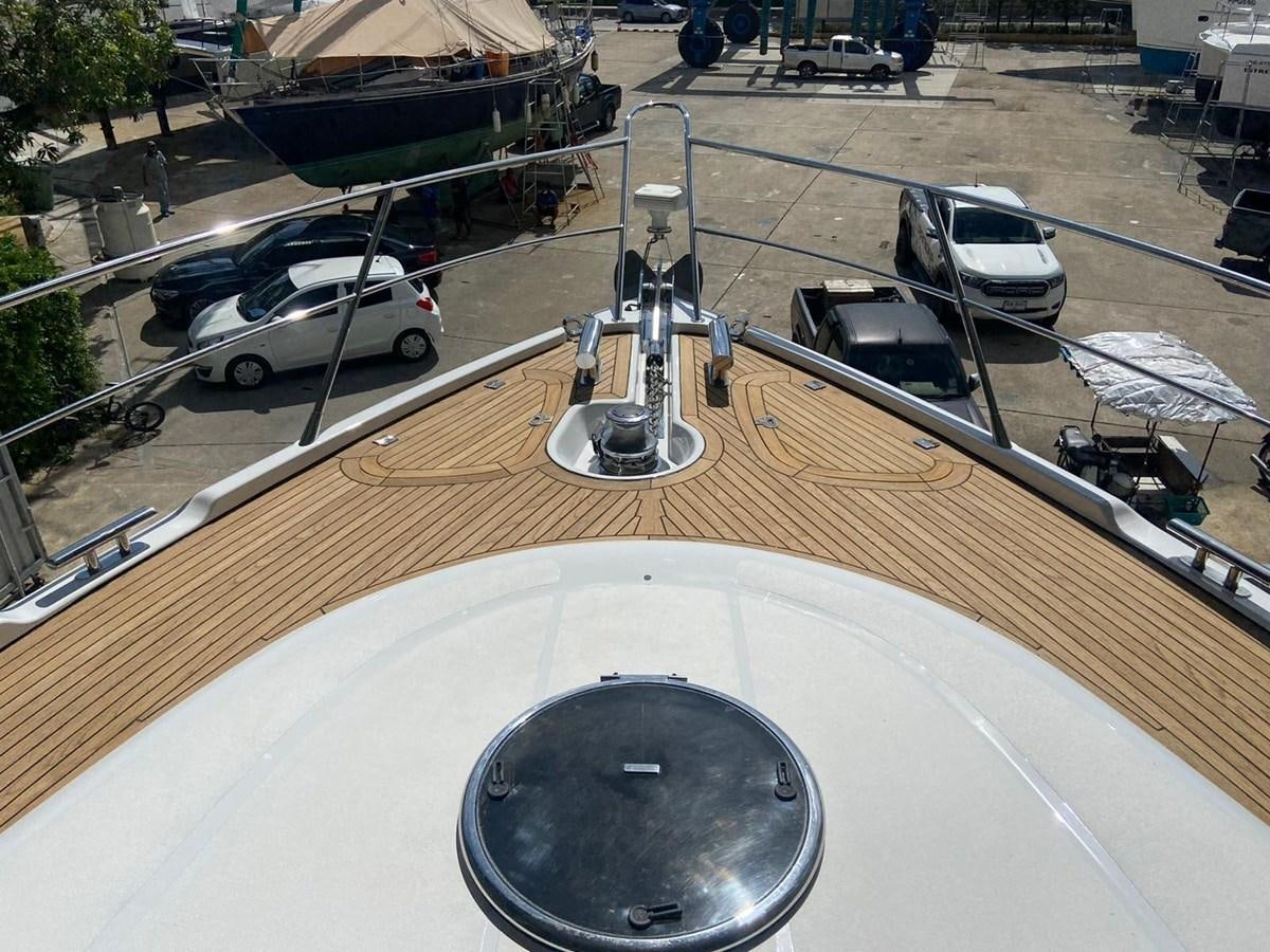 a large guitar on a stage aboard AUGUST MOON Yacht for Sale