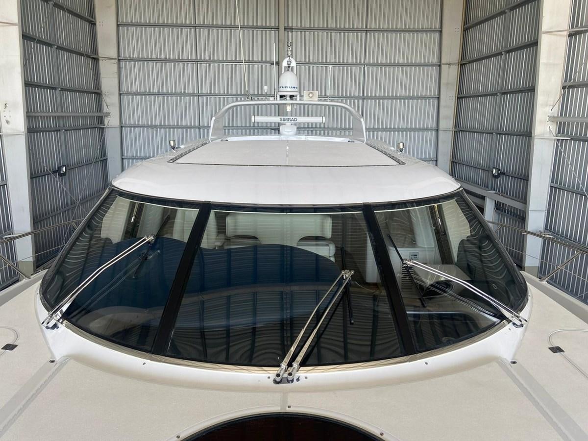 a white car with a hood aboard AUGUST MOON Yacht for Sale