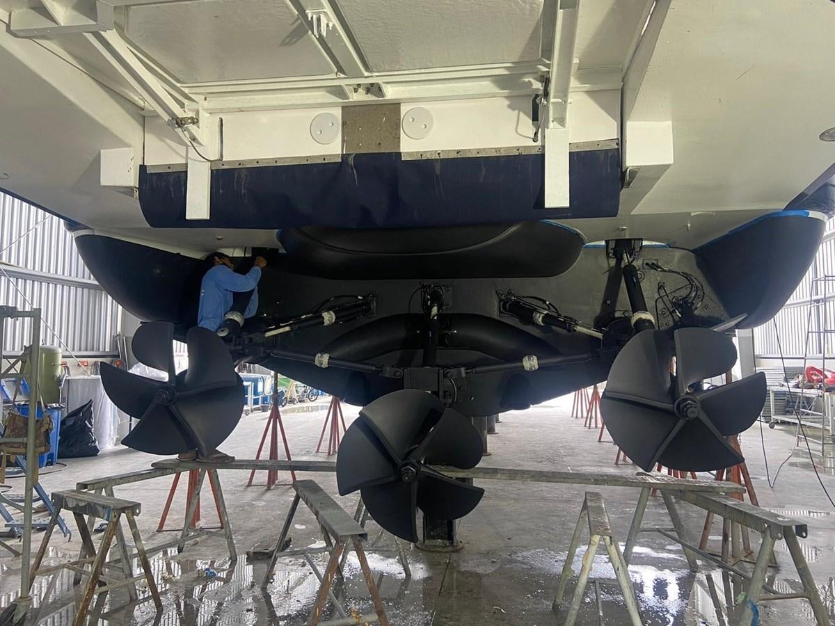 a person working on a machine aboard AUGUST MOON Yacht for Sale