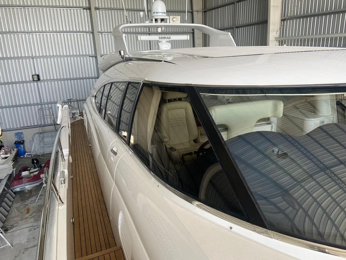 a car with a door open aboard AUGUST MOON Yacht for Sale