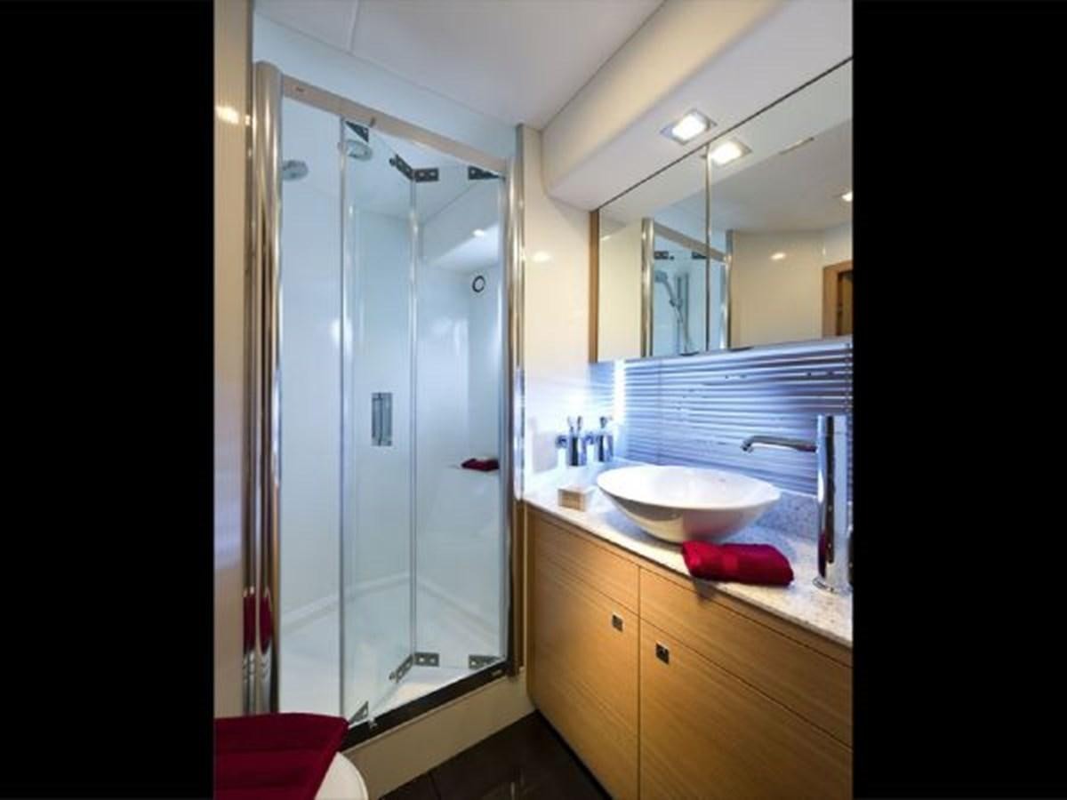 a bathroom with a sink and a shower aboard 2012 SUNSEEKER MANHATTAN 63 Yacht for Sale