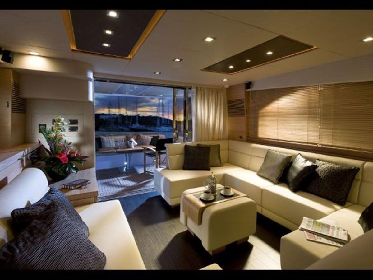 a living room with a large window aboard 2012 SUNSEEKER MANHATTAN 63 Yacht for Sale