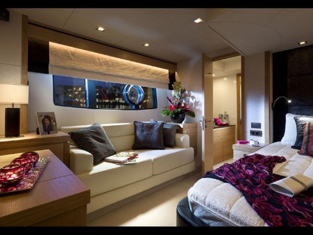 a living room with a couch and a tv aboard 2012 SUNSEEKER MANHATTAN 63 Yacht for Sale