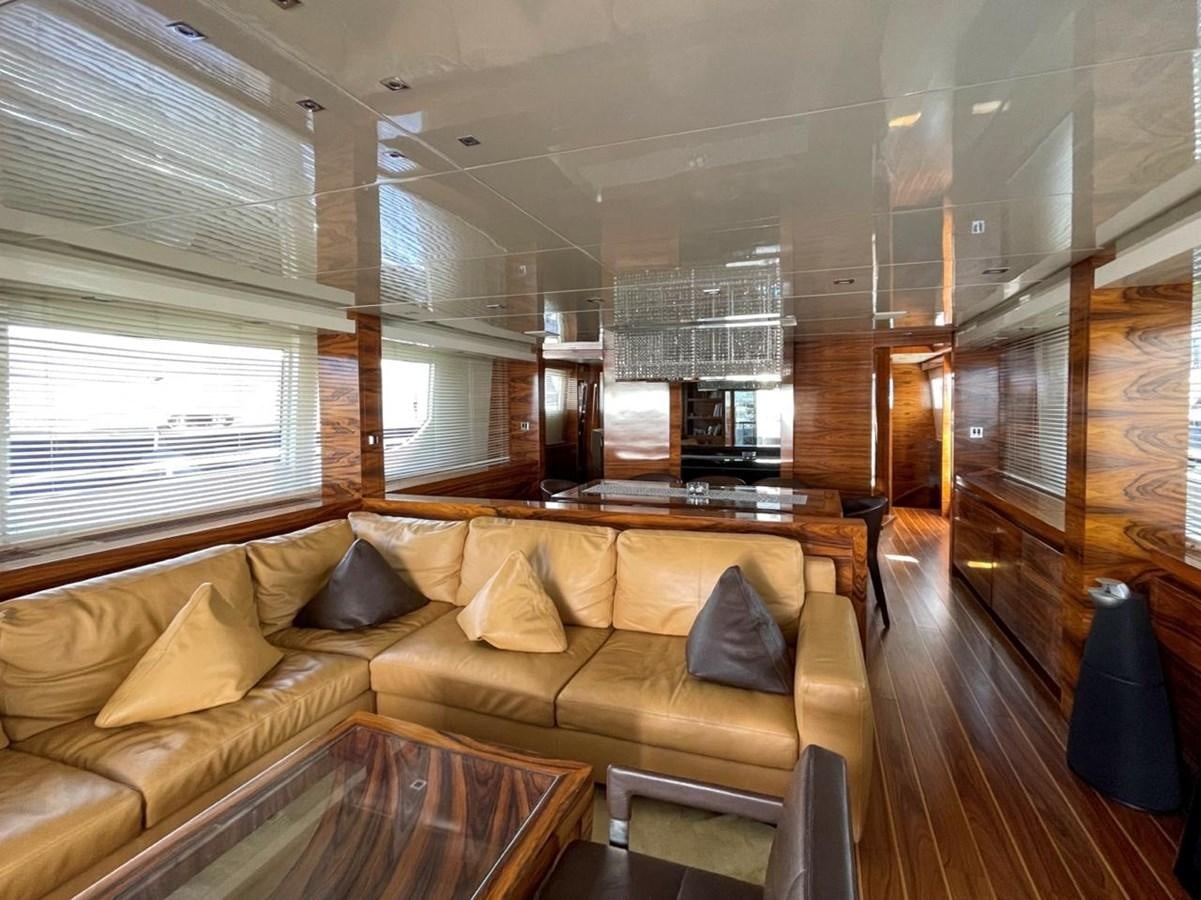 a living room with a couch aboard ELAN Yacht for Sale