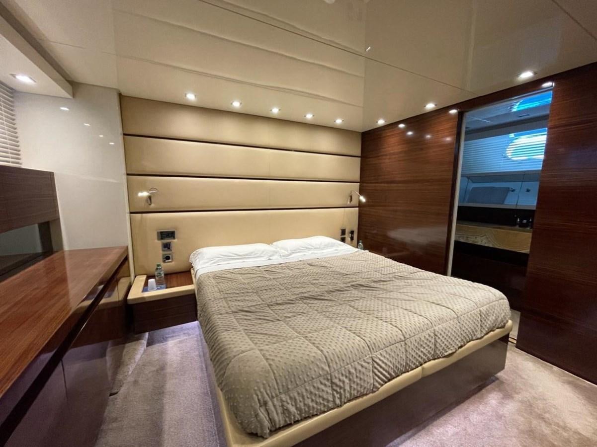 a bed in a room aboard ELAN Yacht for Sale