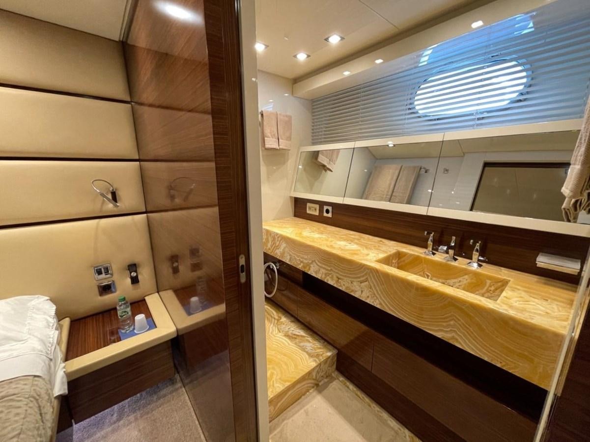 a bathroom with a large mirror aboard ELAN Yacht for Sale