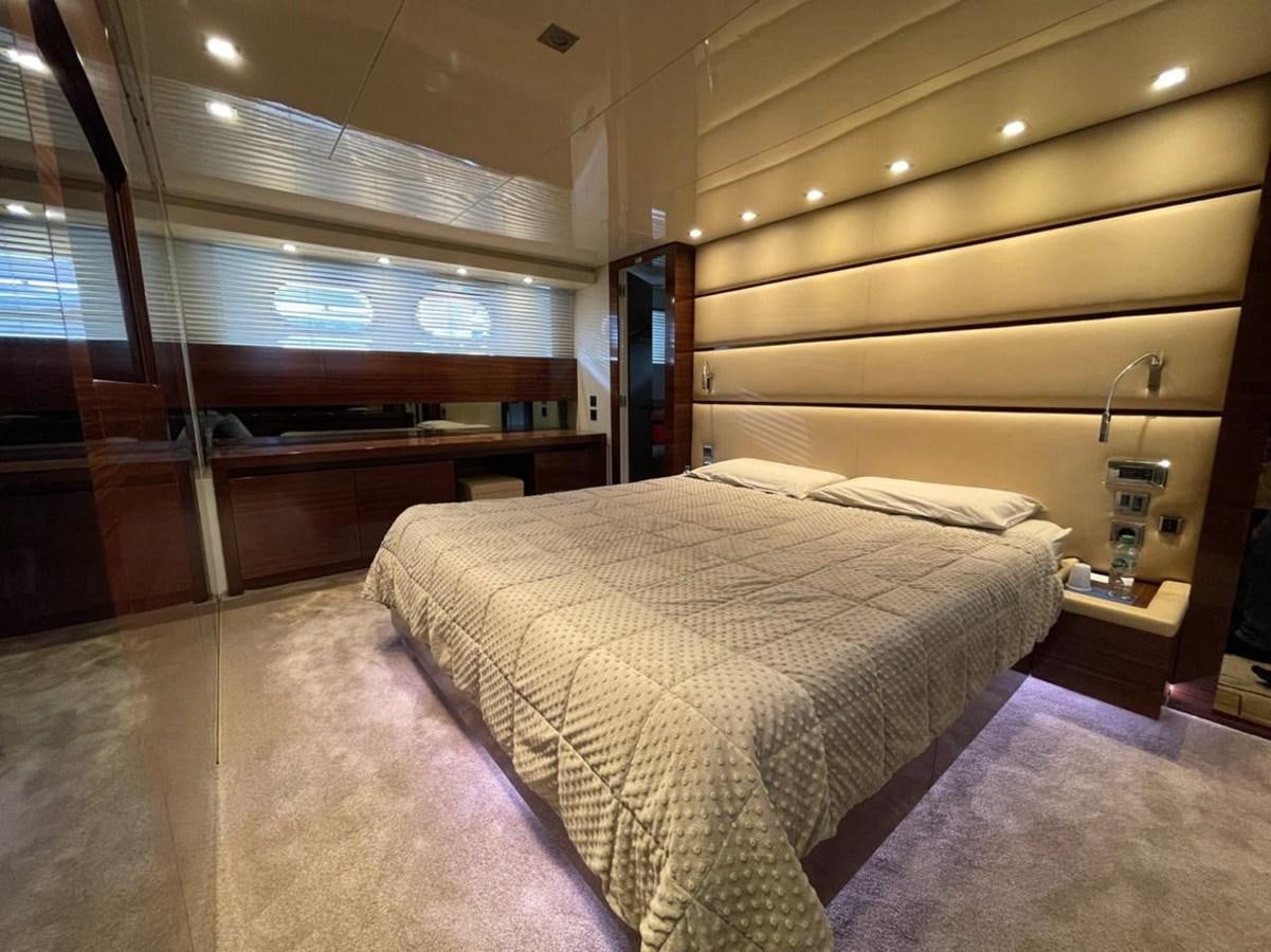 a bedroom with a bed aboard ELAN Yacht for Sale