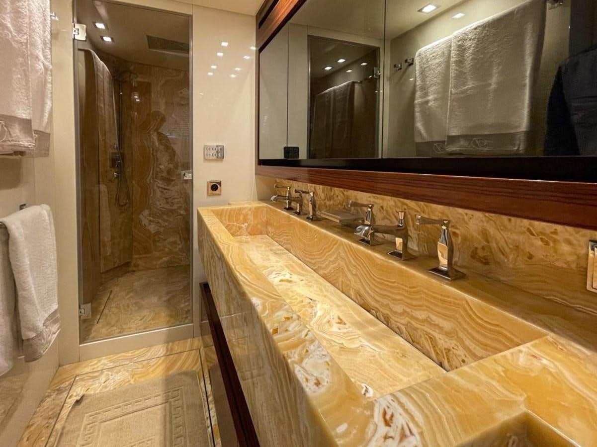 a bathroom with a large countertop aboard ELAN Yacht for Sale