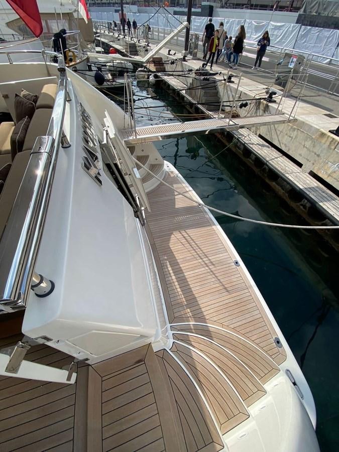 a large white boat in a large body of water aboard ELAN Yacht for Sale