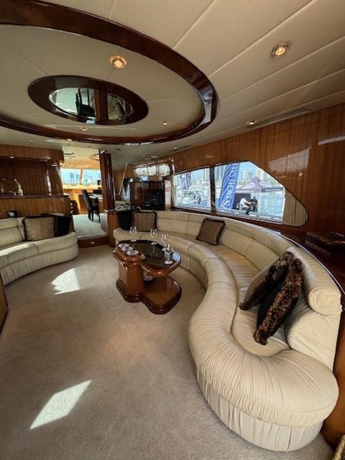 a living room with a large window aboard CLASSIFIED Yacht for Sale