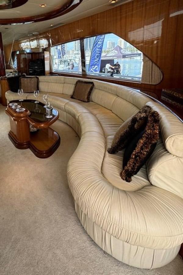 a living room with a large window aboard CLASSIFIED Yacht for Sale