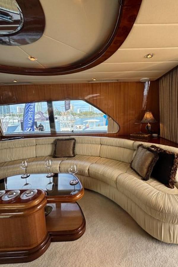 a living room with a large window aboard CLASSIFIED Yacht for Sale