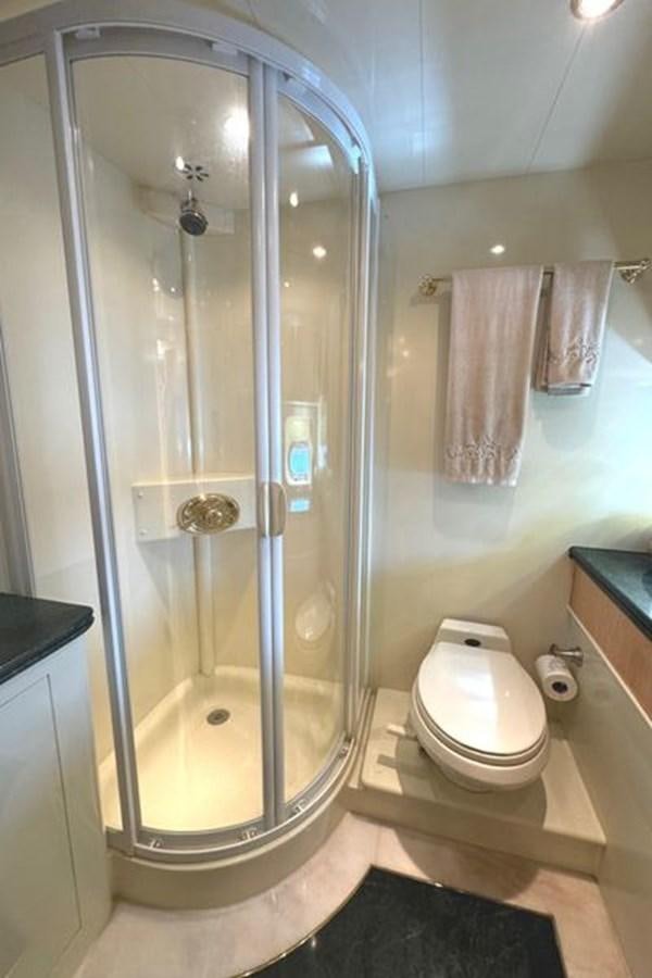 a shower with a glass door aboard CLASSIFIED Yacht for Sale