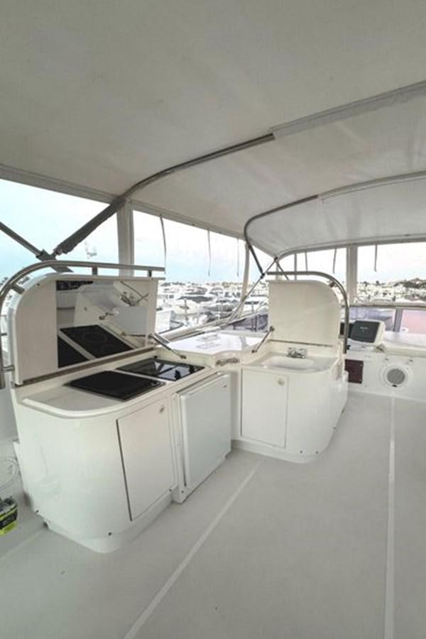 a room with white appliances aboard CLASSIFIED Yacht for Sale