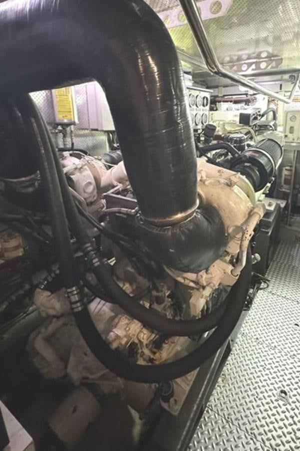 a close-up of a car engine aboard CLASSIFIED Yacht for Sale